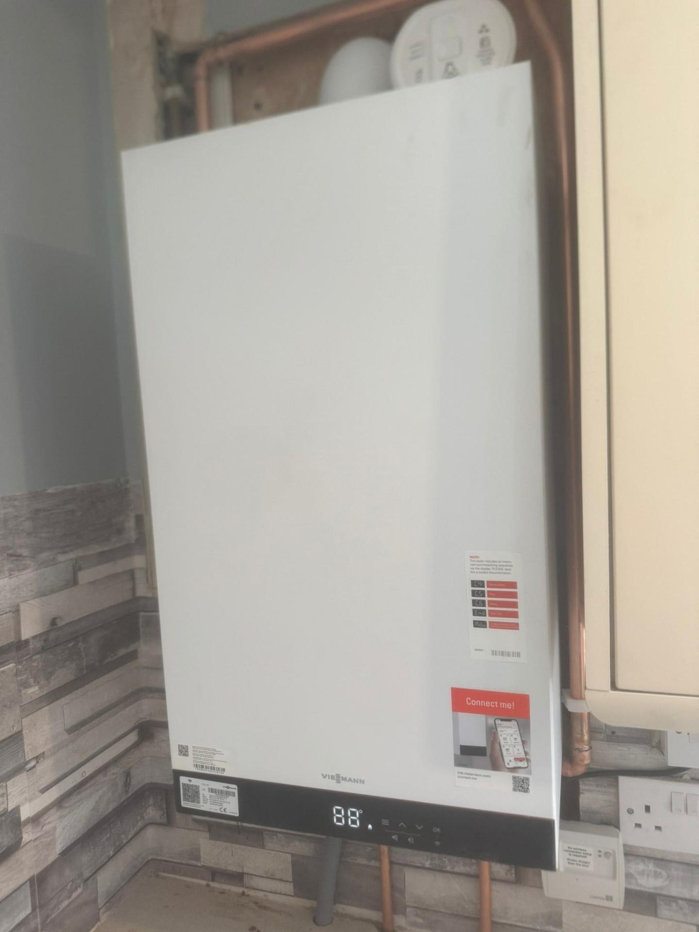 Professional boiler installation by Central One engineer